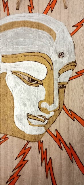 BUDDHA IN PROFILE WITH RADIATING LOVE