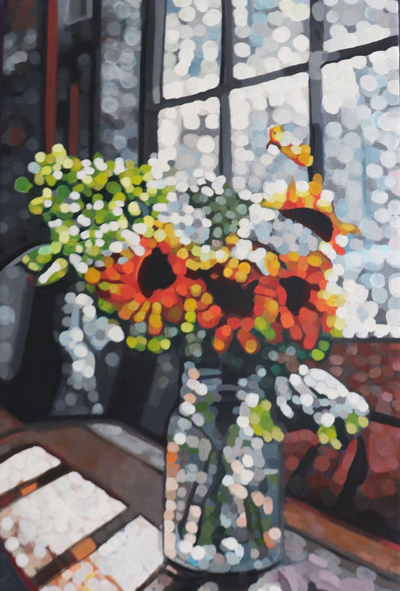 Sunflowers on windowsill