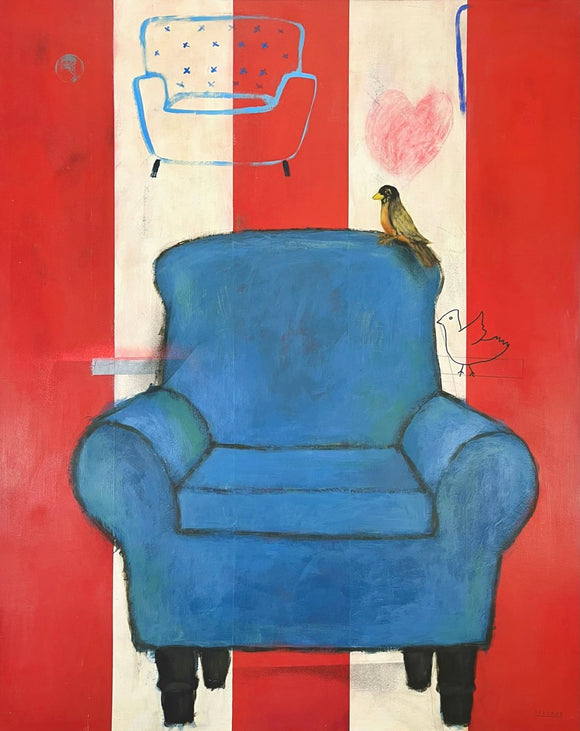 A Blue Couch and A Bird