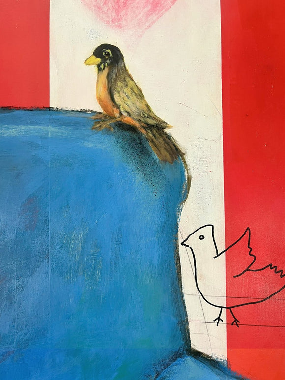 A Blue Couch and A Bird