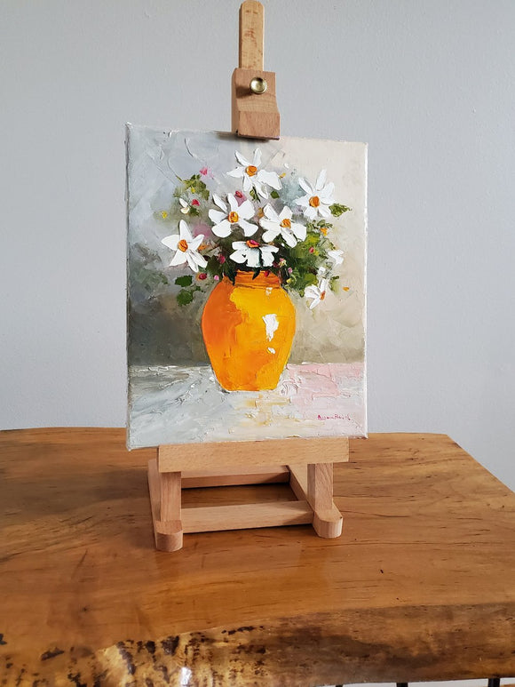 Happiness blooms in a yellow vase