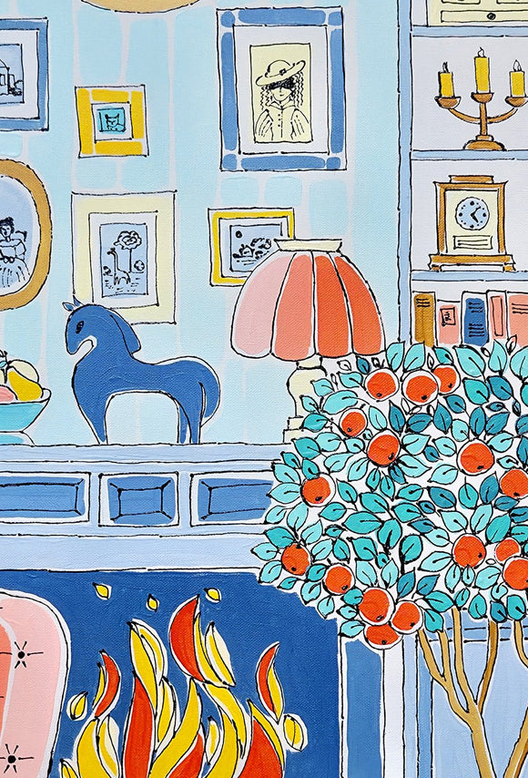 Orange chair beside a fireplace