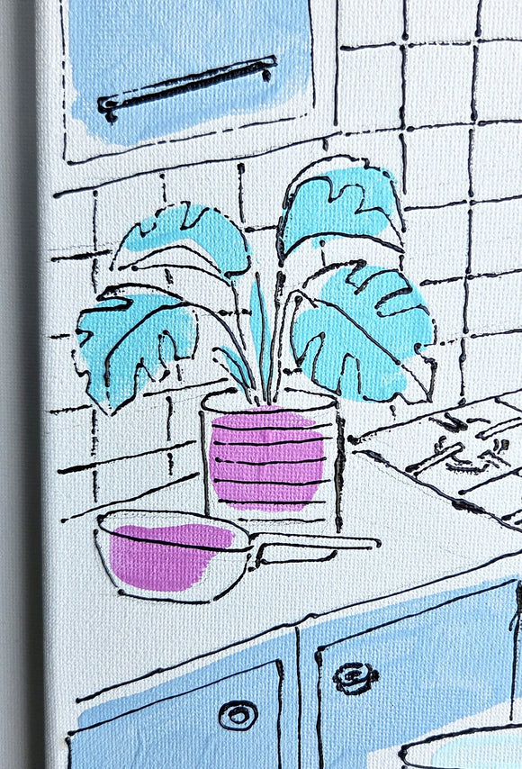Blue kitchen with pink lamp
