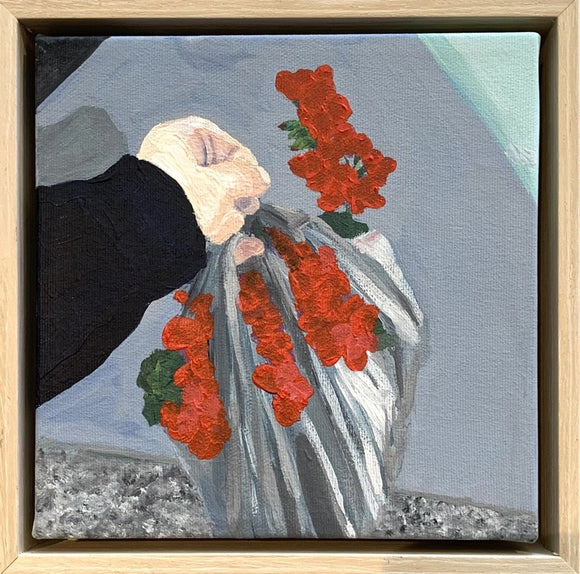 My arm is holding some geraniums