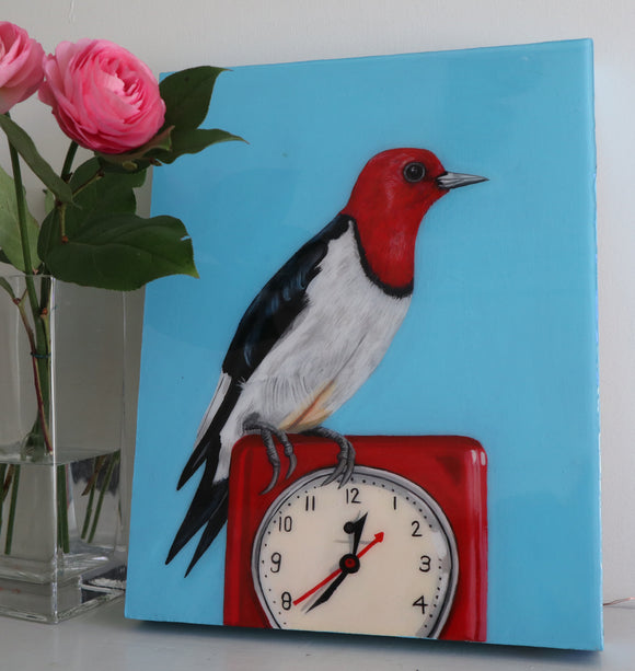 Red Headed Woodpecker on Vintage Clock