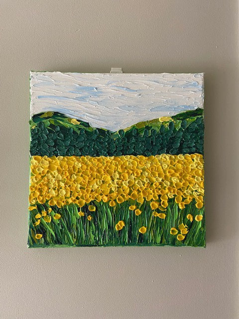 Pointillist yellow flower field