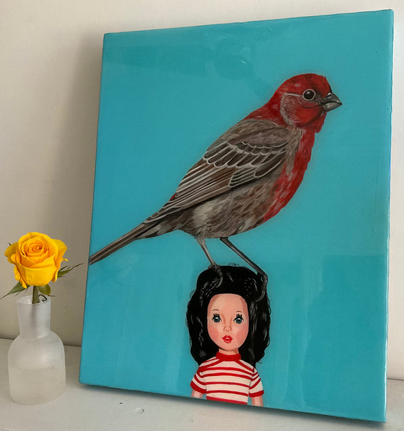 House Finch on Vintage Doll